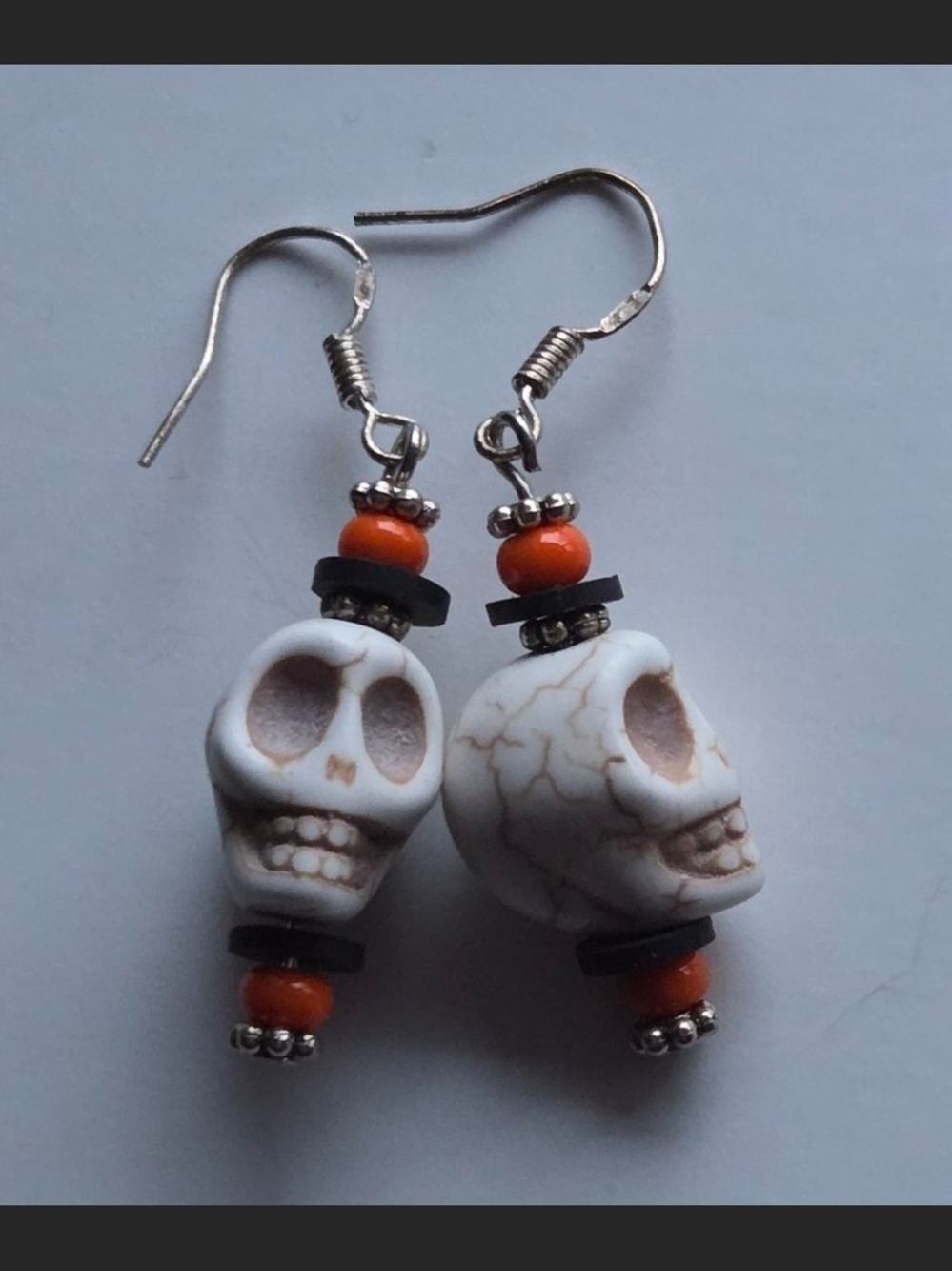 White Howlite Skull Drop Earrings with Orange Accent Beads